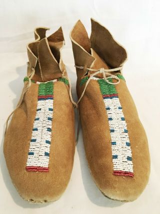 American Indian Beaded Moccasins With Parfleche Soles.