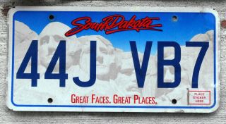Red Cursive South Dakota Lettering Mount Rushmore License Plate