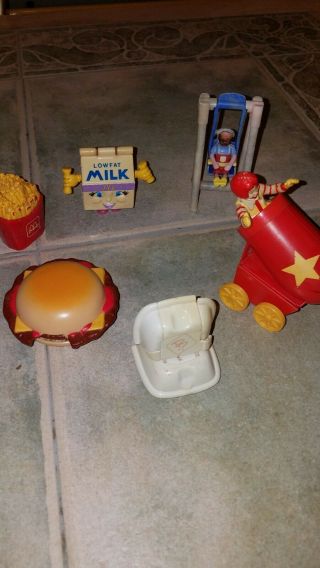 Mcdonalds register/ vintage happy meal toys,  red,  yellow,  and white items 4