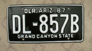 44 - Arizona 1987 Dealer License Plate,  With Attached Paperwork
