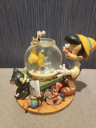 Disney Pinocchio Musical Snow Globe Plays Toyland By Victor Herbert