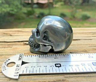1.  5 " Realistic Hematite Carved Skull Crystal Healing