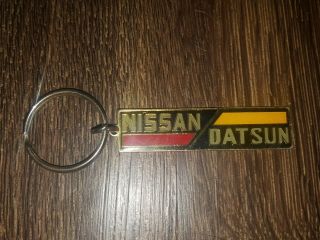 Vintage Nissan Datsun Automobile Promotional Keychain 1980