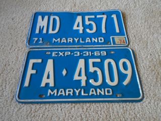 2 Different Maryland Vintage License Plates.  Look
