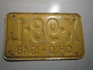 1948 Ohio license plate number X 98 L.  4 digit 10 inch plate.  Flat Aluminum 4
