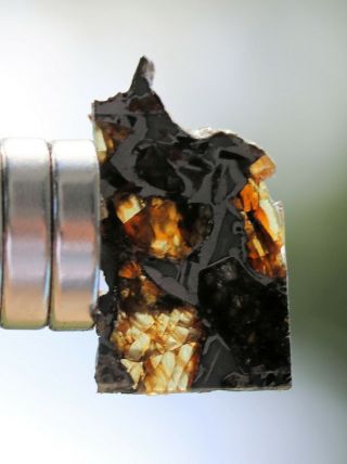 Admire Pallasite Meteorite,  1.  7 grams,  Kansas 2