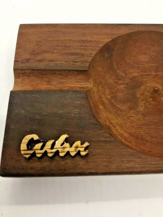 Cigar Ash Tray from Cuba.  Raised Center,  three holders.  CUBA on front.  Solid Wood 3