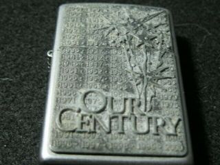 Zippo Lighter.  1999.  Plate on front of Case 