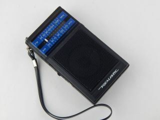 Vintage Realistic Am/fm Portable Pocket Radio 12 - 724 Transistor Great