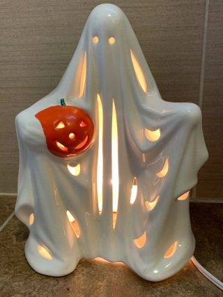 Vintage 10” Ceramic Halloween Ghost Holding A Pumpkin,  Lighted,