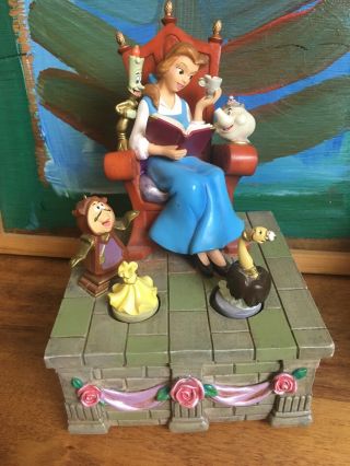 Disney Beauty And The Beast Belle Sitting In Chair With Several Figures Musical
