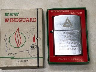 Vintage Ad Windguard Cigarette Lighter S.  F.  Iowa Agri Equipment Fairfield Iowa