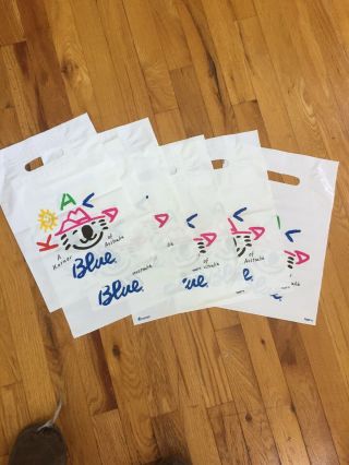 6 Olivia Newton John Koala Blue Bags.