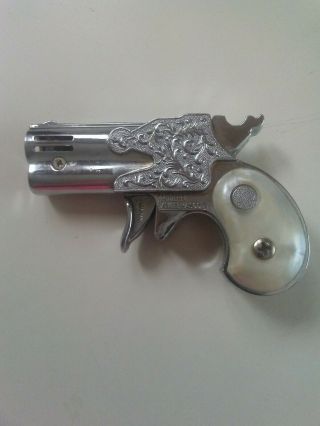 Vintage Modern Angel Mascot 73891 Gun Lighter With Pearl Handle.