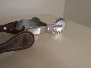 Cowboy spurs a silver Crockett ' s the leather is great 5