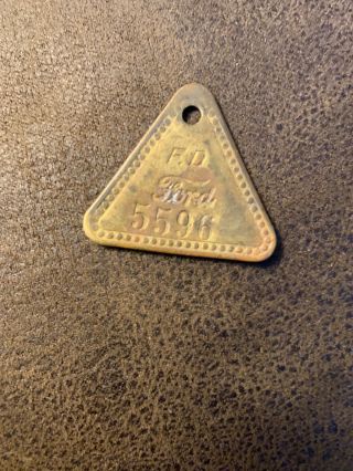 Ford Motor Co.  Brass Tool Tag - Highland Park,  Michigan.  5596.