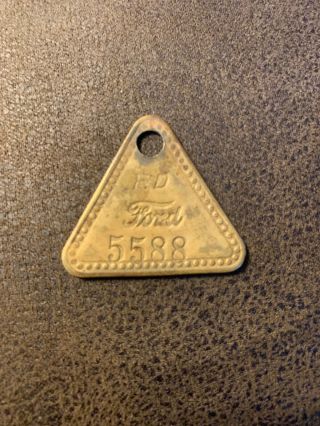Ford Motor Co.  Brass Tool Tag - Highland Park,  Michigan.  5588.