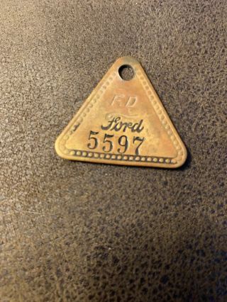 Ford Motor Co.  Brass Tool Tag - Highland Park,  Michigan.  5597.