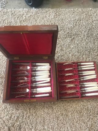 12 Person Set Of Antique Mother Of Pearl Handle Flatware.
