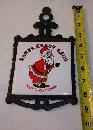Vintage Souvenir Santa Claus Land 4 1/4 " Trivet In Black Iron Holder
