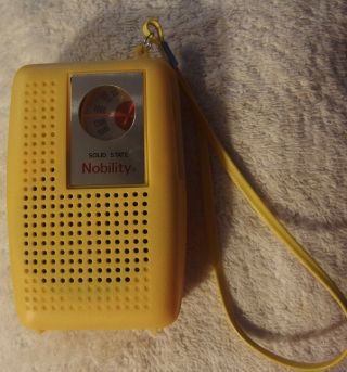 Vintage Yellow " Nobility " Am Solid State Pocket Transistor Dial Radio
