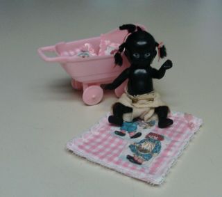 Vintage Jointed Plastic Black Baby Doll With Vintage Pink Carriage Etc