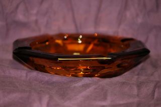 Vintage Amber glass ashtray.  heavy.  Octagon - 4 cigarette placings 2