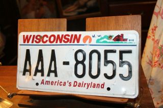 License Plate 2012 Wisconsin Aaa - 8099 Bent Dented