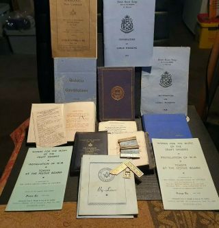 A medal and assortment of Freemason Masonic books and booklets 2