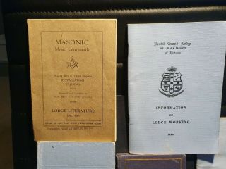 A medal and assortment of Freemason Masonic books and booklets 3