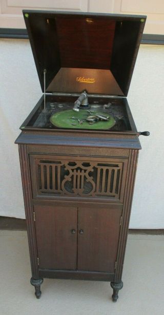 ANTIQUE SILVERTONE PHONGRAPH RECORD PLAYER IN WOOD CABINET WITH HORN NE 2