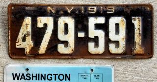 1919 White On Black York License Plate