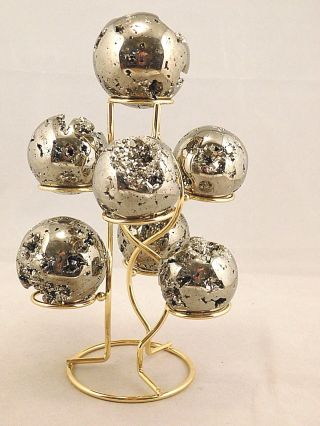 A Neat Seven Sphere,  Egg,  Golf Ball Or Whatever? Brass Or Gold Display Stand