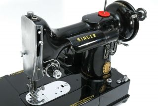 Singer 222k sewing machine with case and attachments.  110v. 3