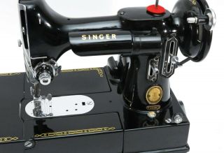 Singer 222k sewing machine with case and attachments.  110v. 4