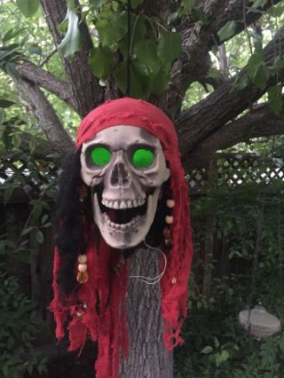 Hanging Pirate Skull With Bandana And Hair Color Changing Eye Lights Halloween