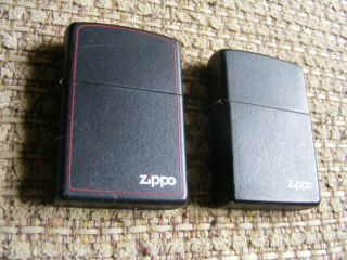 2 Vintage zippo lighters in black matte case 2
