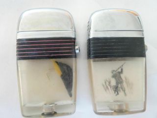 Vintage (2) Larger SCRIPTO VU Lighters with Fishing Lure & Duck Hunter 2