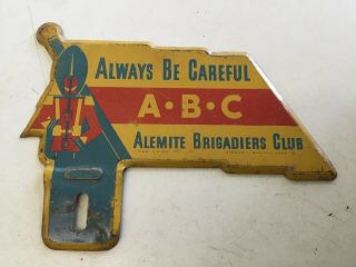 Vintage Alemite Brigadiers Club Metal License Plate Topper By Stewart Warner