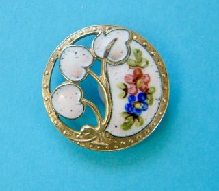 A 23mm Antique French Art Nouveau Pierced Floral White Enamel Button
