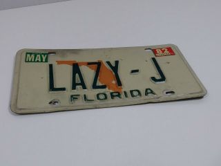 Florida aluminum vanity license plate LAZY - J State plate expired sunshine State 2