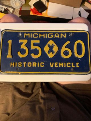 Michigan License Plate - Historic Vehicle.  Yellow Border.  135 - 50.  - Solid.