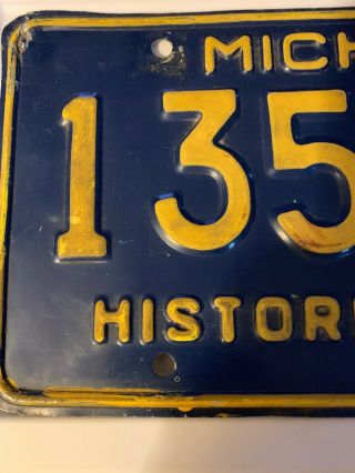 Michigan License Plate - Historic Vehicle.  Yellow Border.  135 - 50.  - Solid. 2