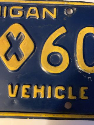 Michigan License Plate - Historic Vehicle.  Yellow Border.  135 - 50.  - Solid. 4