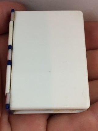 Vintage Plastic Figural Book With Hidden Pocket Lighter