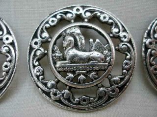 Four Antique Egyptian Revival Silver Buttons.