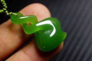 China Natural Bright Green Jade Nephrite Hand Carved Spiral Pendant Necklace