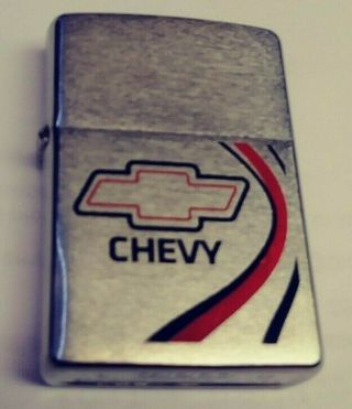 NOS 2009 Zippo Chevy bowtie brushed chrome lighter red black never filled/used 2