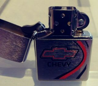 NOS 2009 Zippo Chevy bowtie brushed chrome lighter red black never filled/used 3