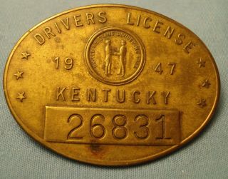 Drivers License Badge.  Kentucky 1947.  No 26831.  1 1/4 X 1 9/16 ".  Brass.  Made By